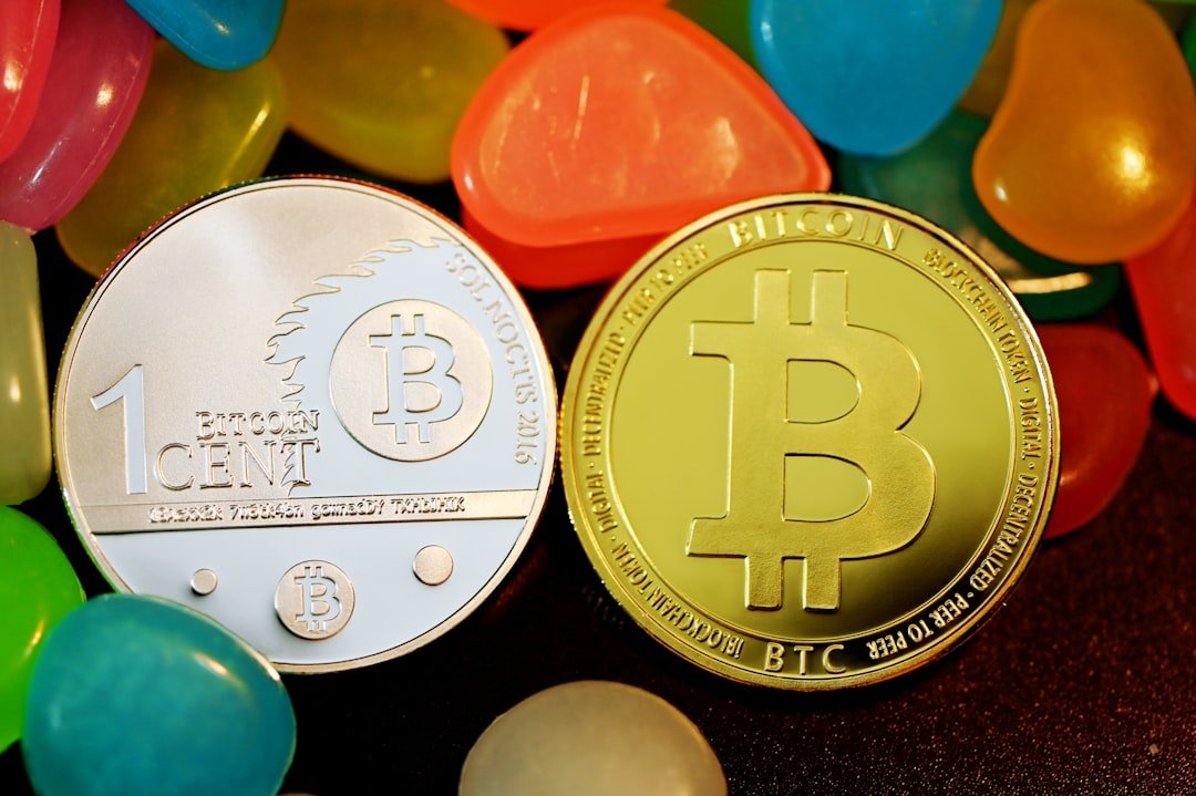 a bit coin sitting next to jelly beans