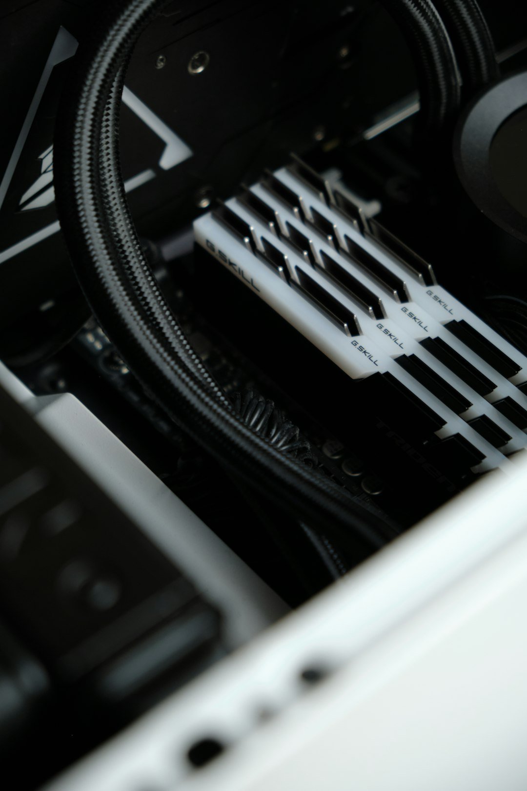 the inside of a computer case with wires and cables