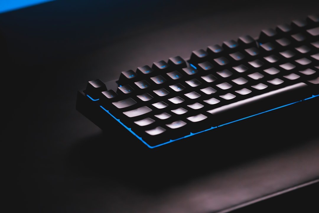 a close up of a computer keyboard on a desk