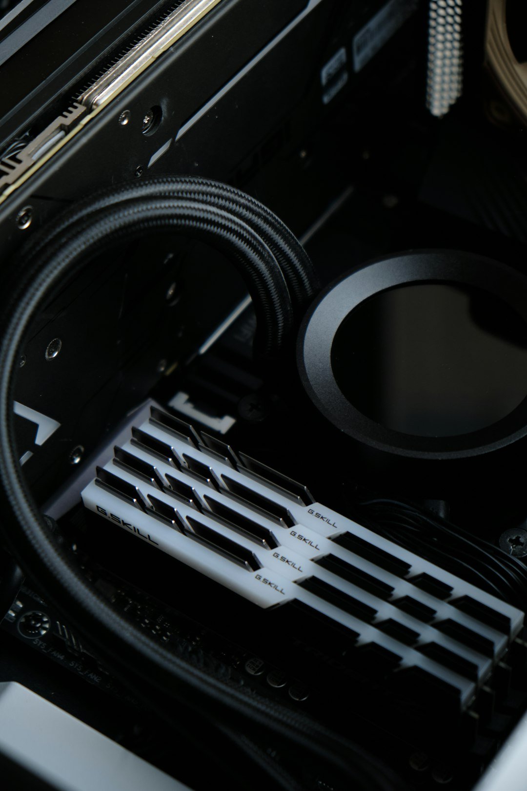 a close up of a computer case with a speaker