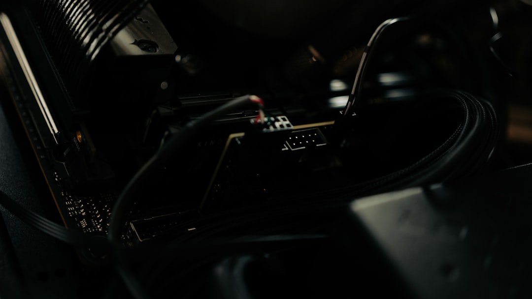 A record player is shown in low-lit darkness.