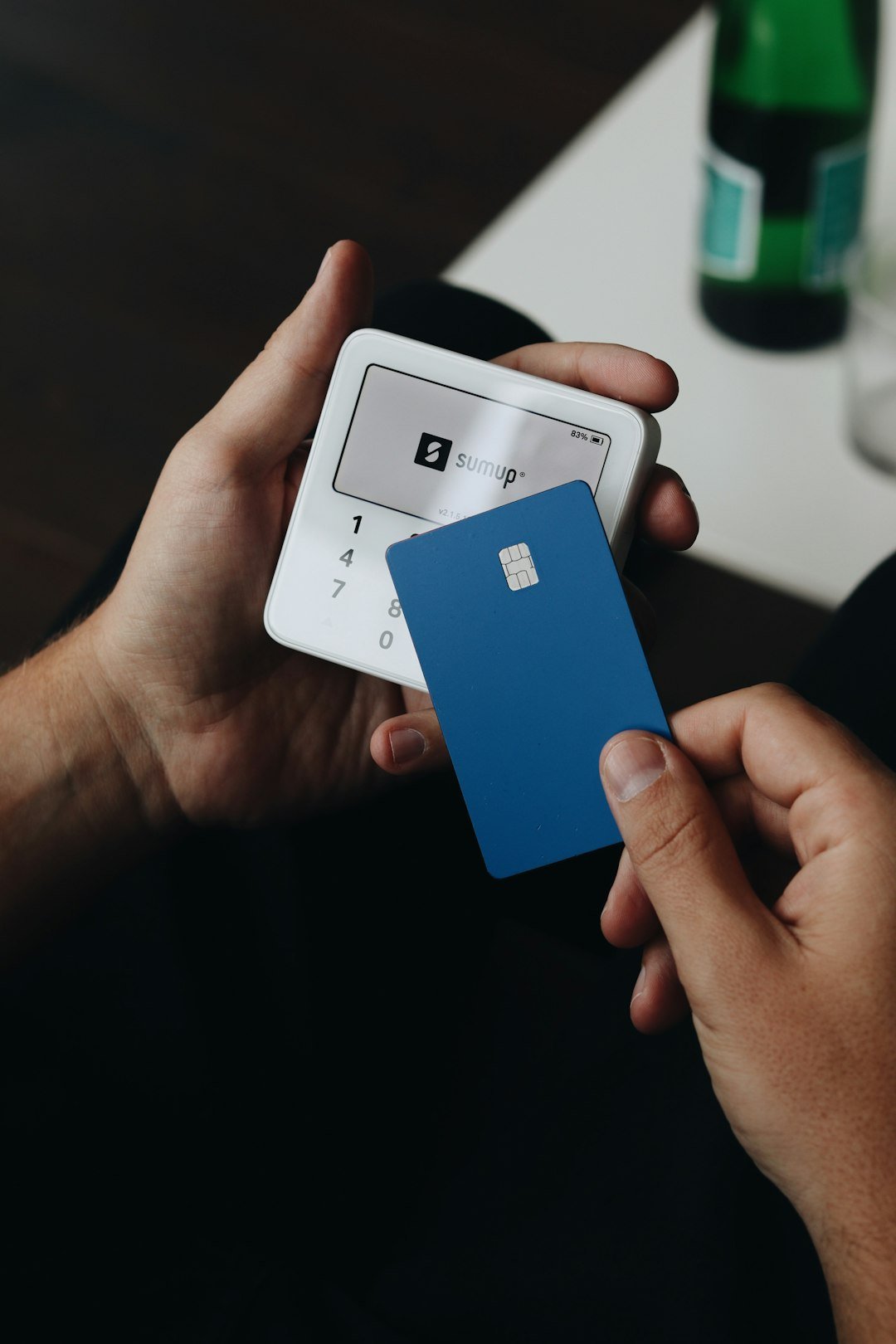 A person holding a smart phone in their hand