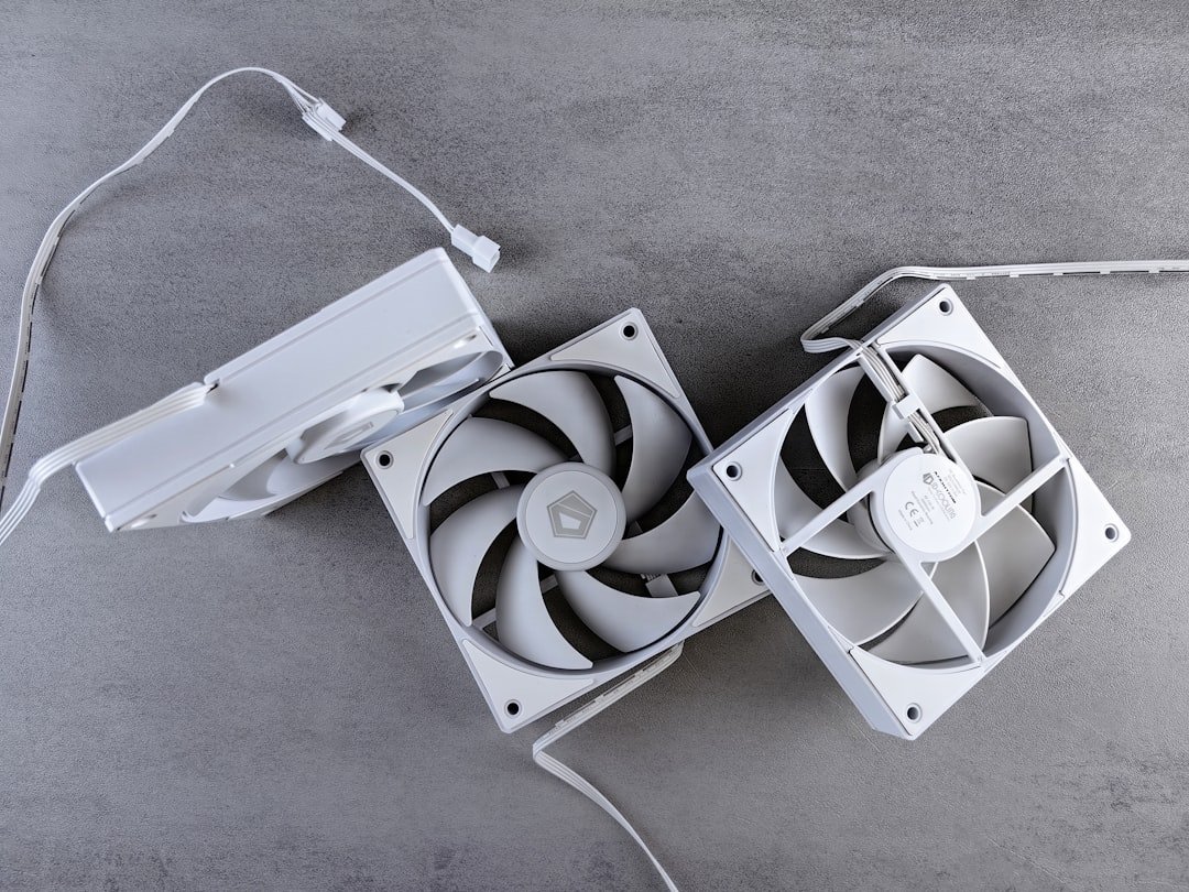 a couple of fans sitting on top of a floor