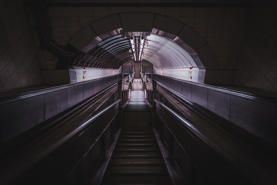 a dark staircase with lights