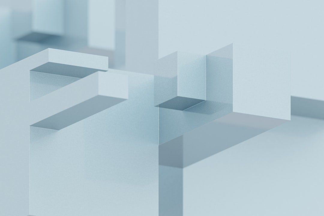 A blurry photo of a white wall