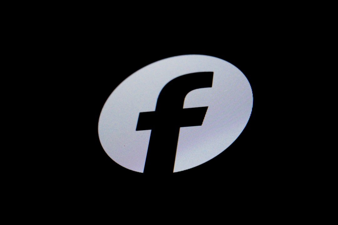 A silver 'f' logo on a black background