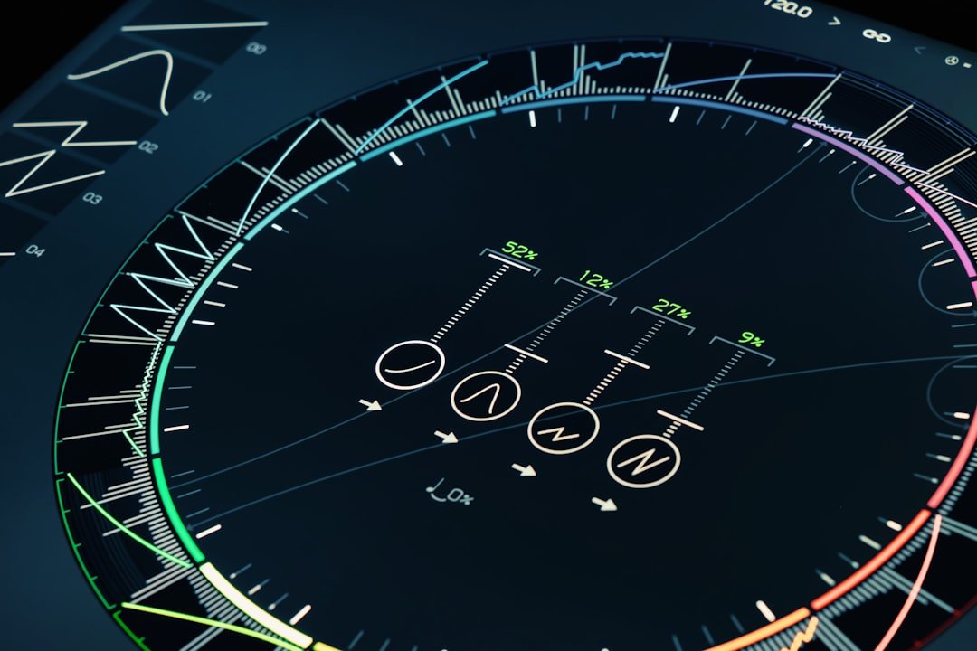 A close up of a watch face with different colors