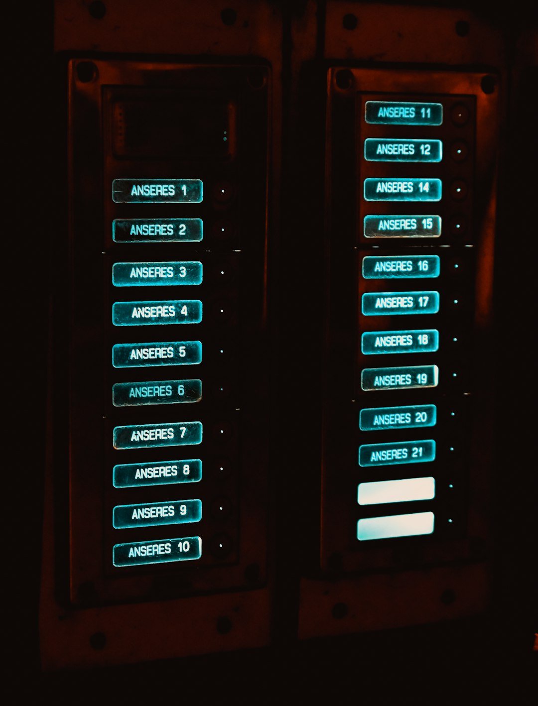 a couple of metal signs sitting next to each other