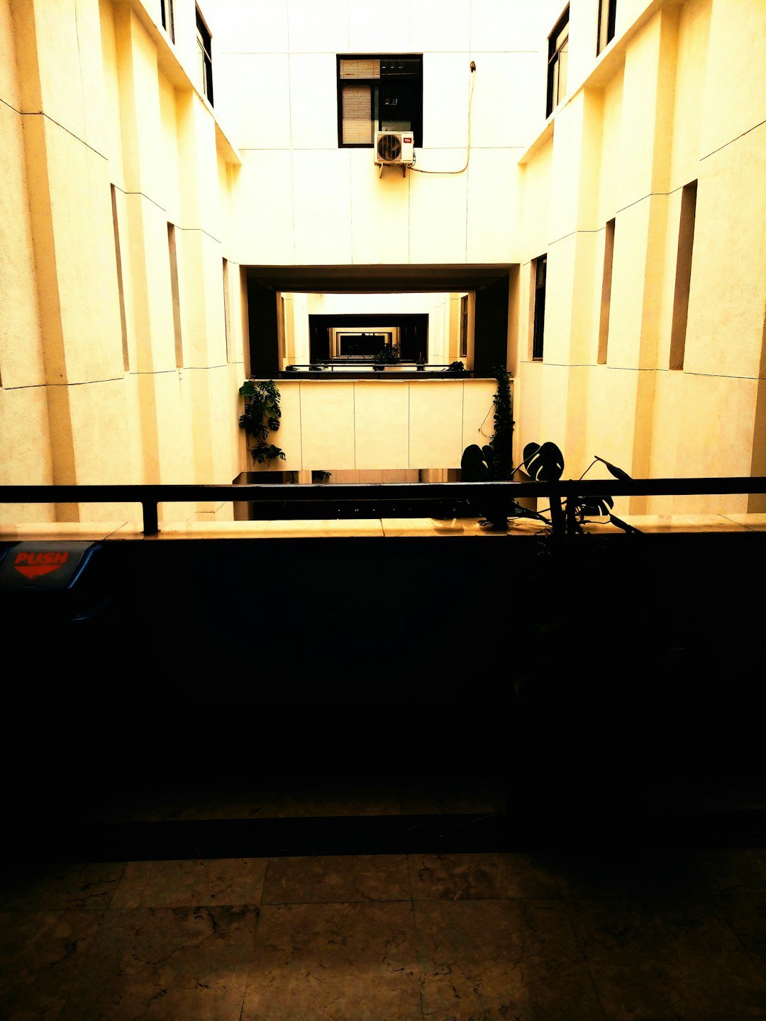 a view of a building from a balcony