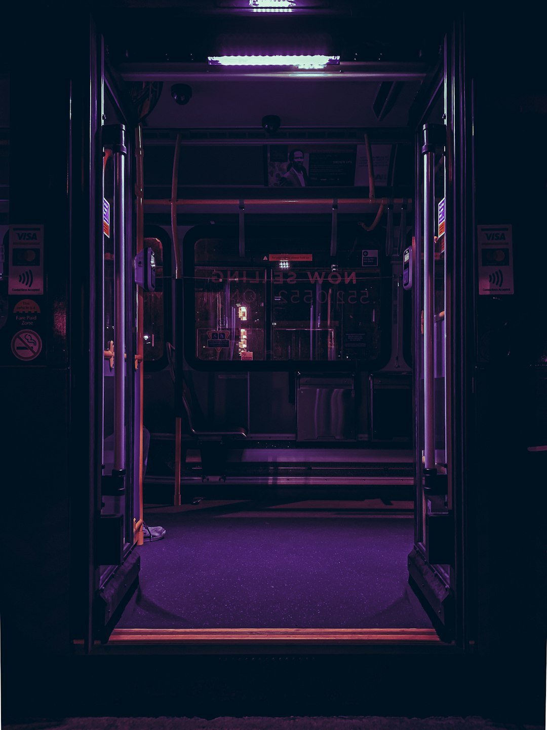 train with lights turned on during night time