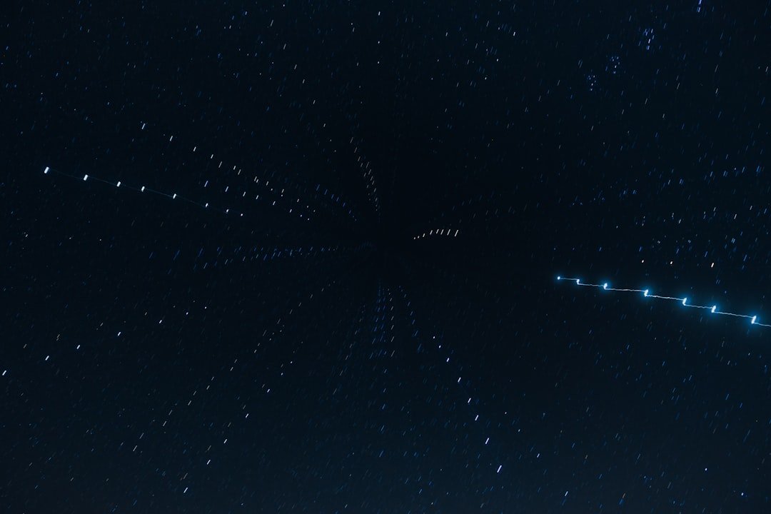 A very large star in the middle of a night sky